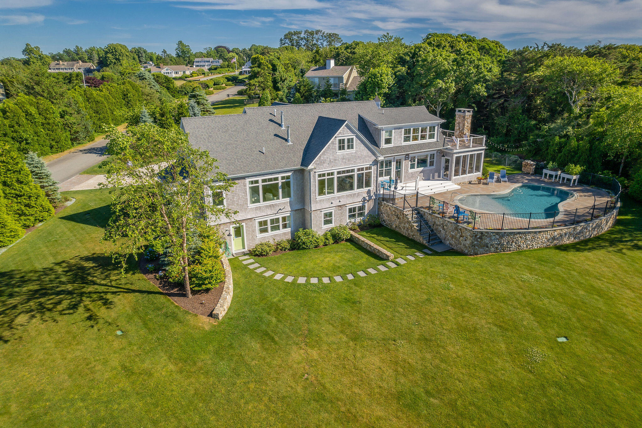 111 Harris Meadow Lane Barnstable, MA 02630 - Photo 51 of 56 an aerial view of a house with a garden and swimming pool
