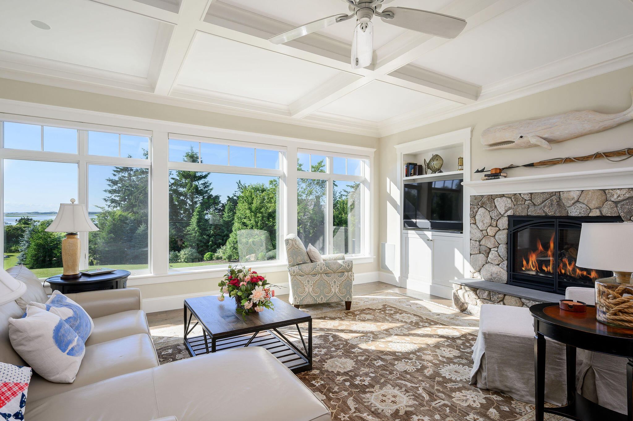 111 Harris Meadow Lane Barnstable, MA 02630 - Photo 10 of 56 a living room with furniture and a fireplace