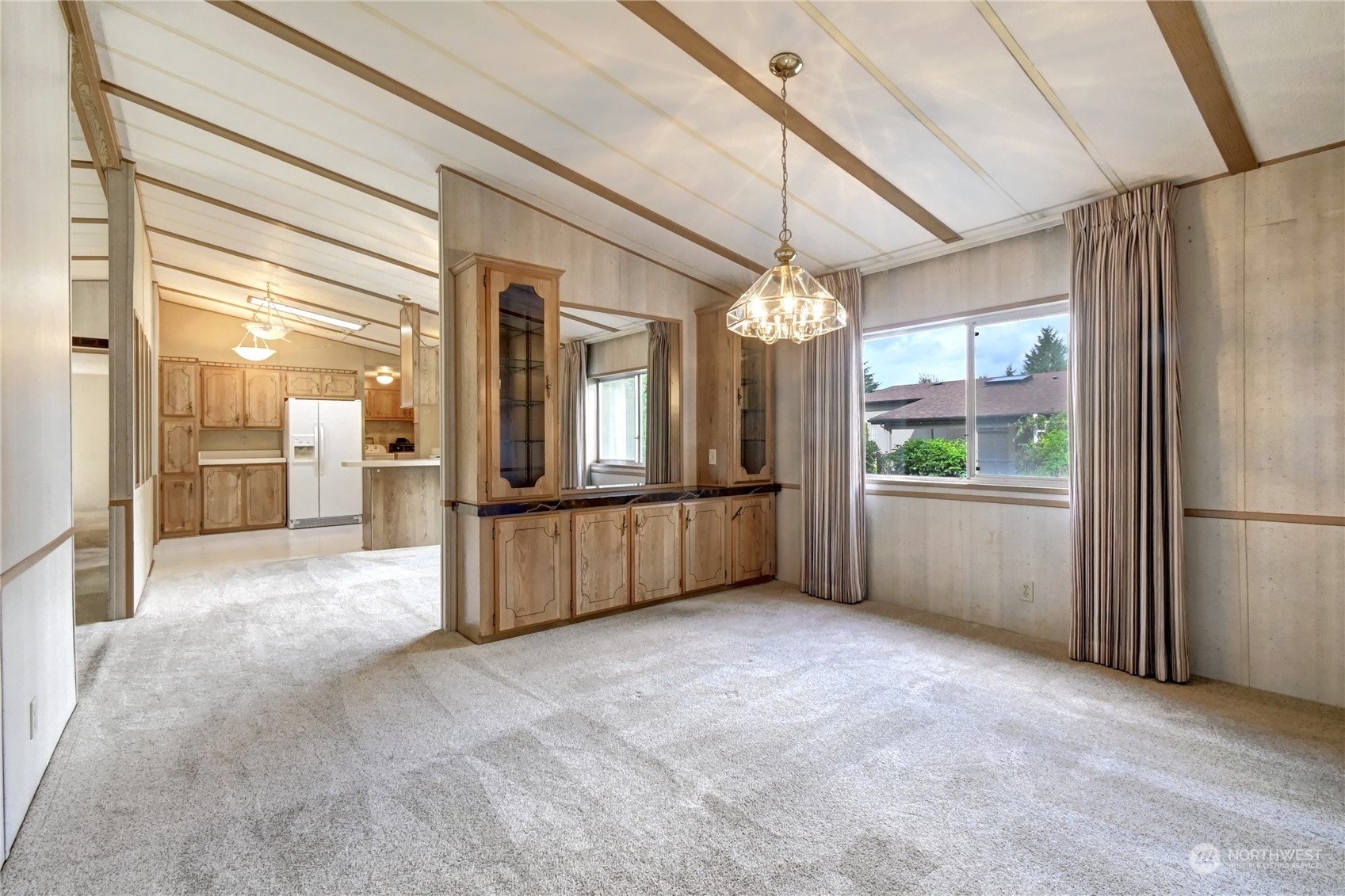 23827 7th Place West Bothell, WA 98021 - Photo 12 of 36 a view of a kitchen with a refrigerator and a sink