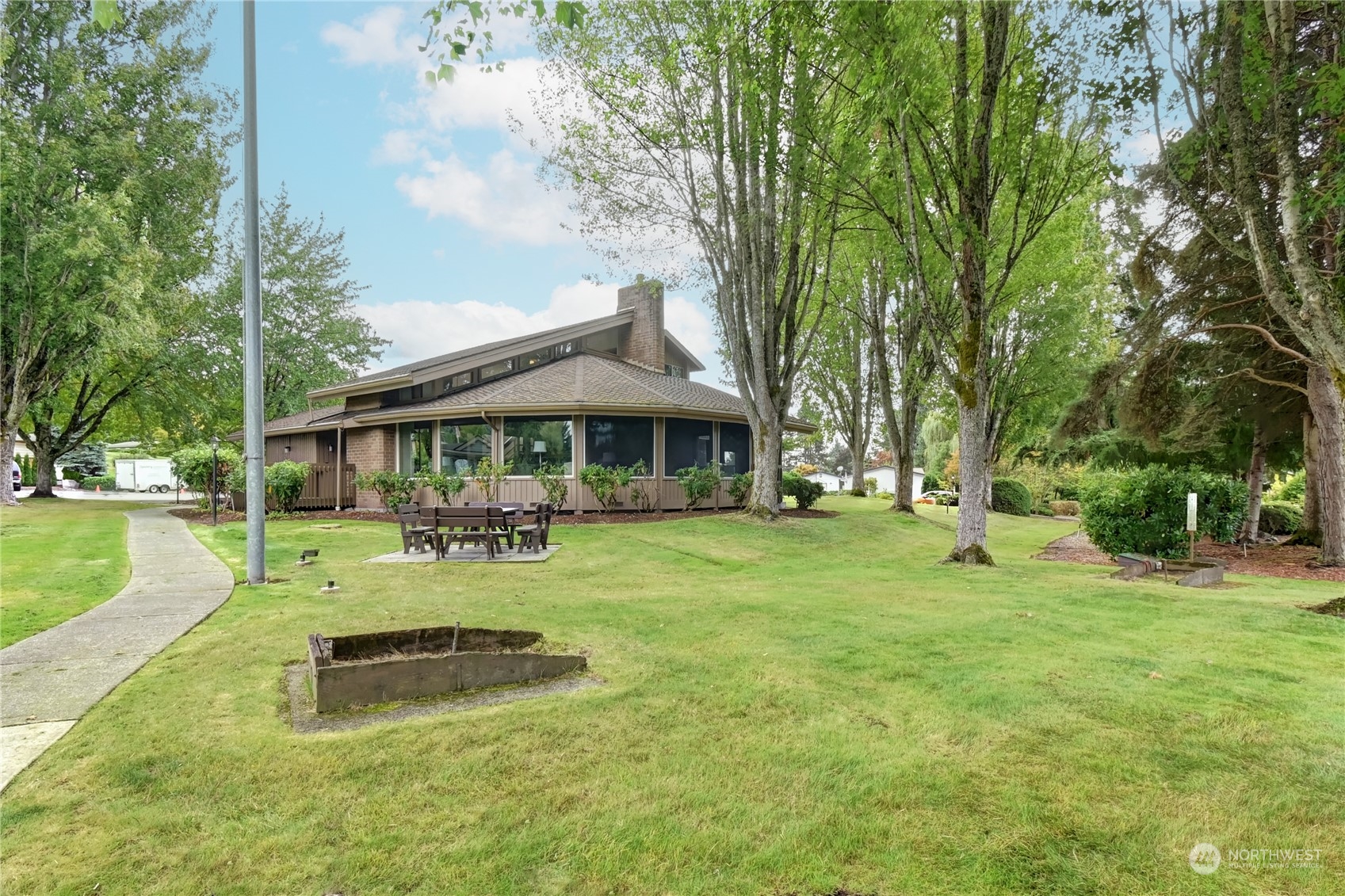 23827 7th Place West Bothell, WA 98021 - Photo 33 of 36 a view of a house with a yard patio and a patio