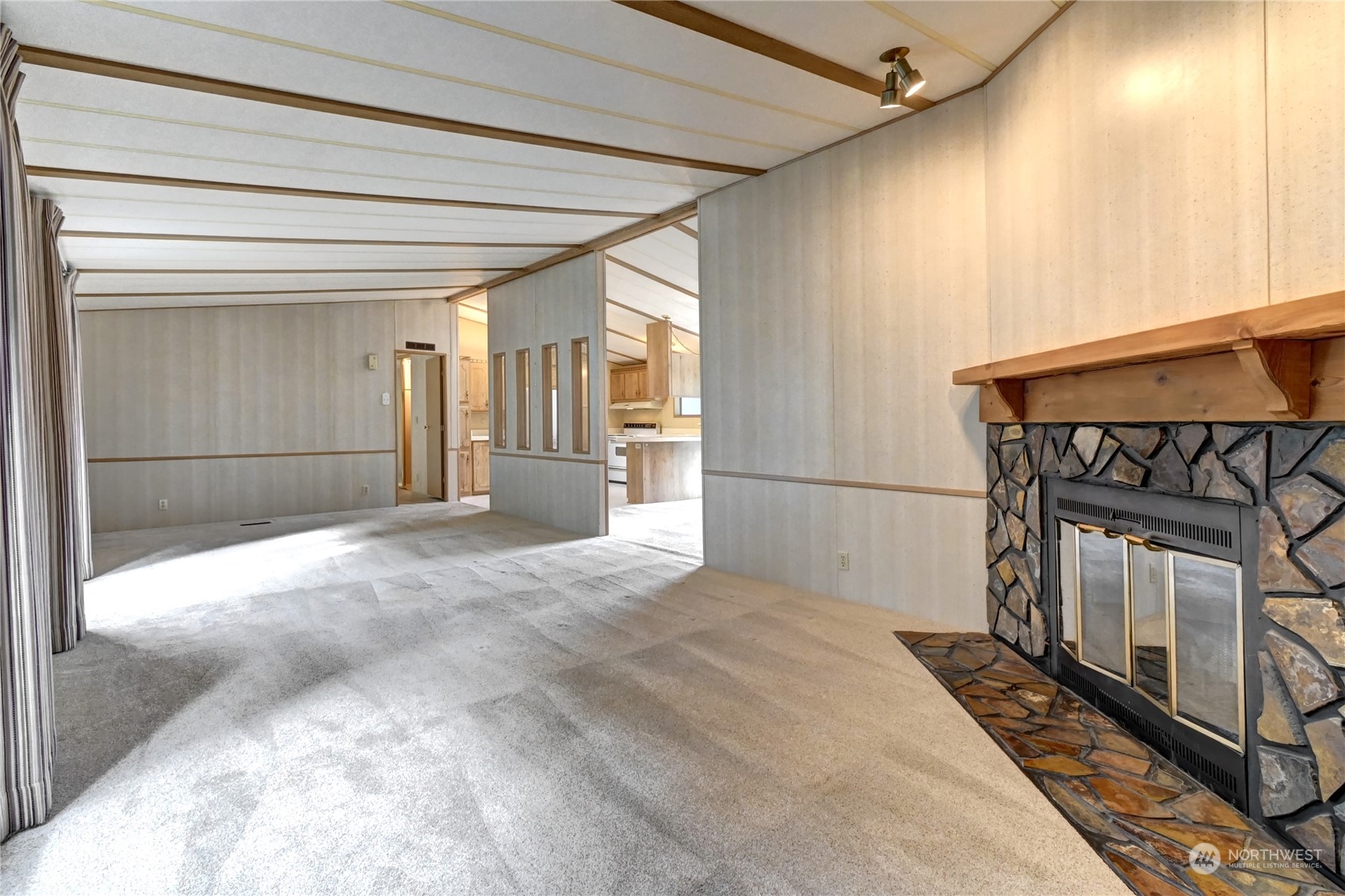 23827 7th Place West Bothell, WA 98021 - Photo 6 of 36 a view of empty room with wooden floor and fan