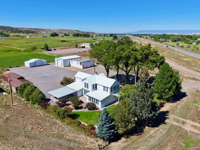 an aerial view of a house with garden