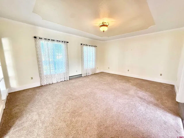 wooden floor and windows in an empty room