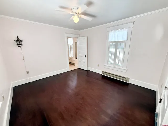 a bathroom with a sink vanity and mirror
