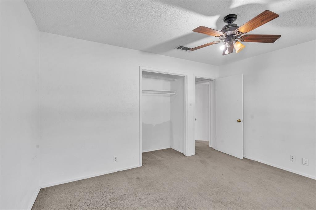 1720 Timbercreek Road Benbrook, TX 76126 - Photo 21 of 33 Neutral-toned carpet flooring and white painted walls