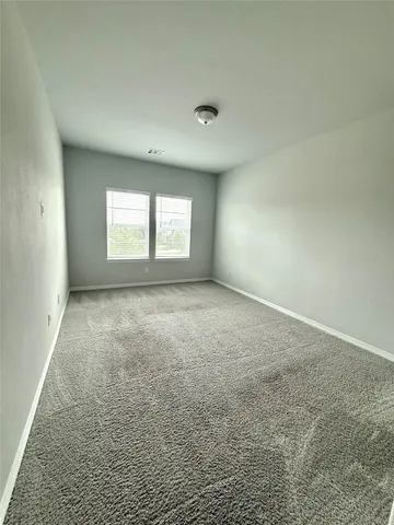 a view of a living room with a furniture