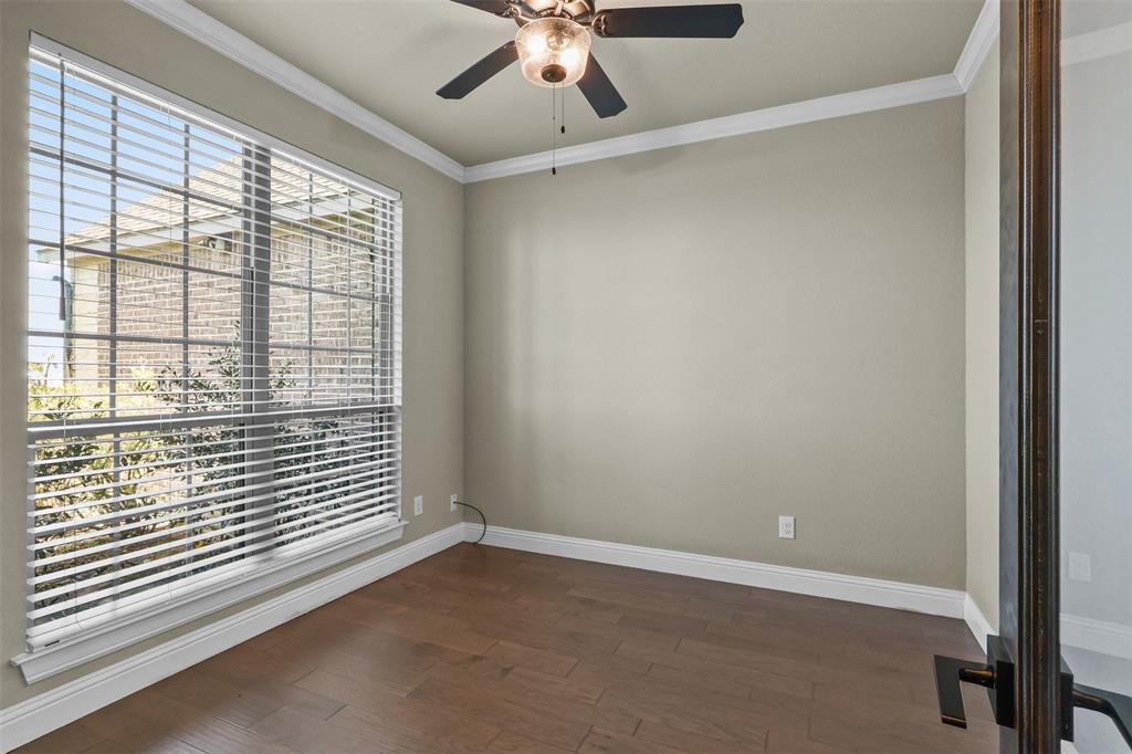 2451 Neck Road Palmer, TX 75152 - Photo 4 of 32 a view of an empty room with a window