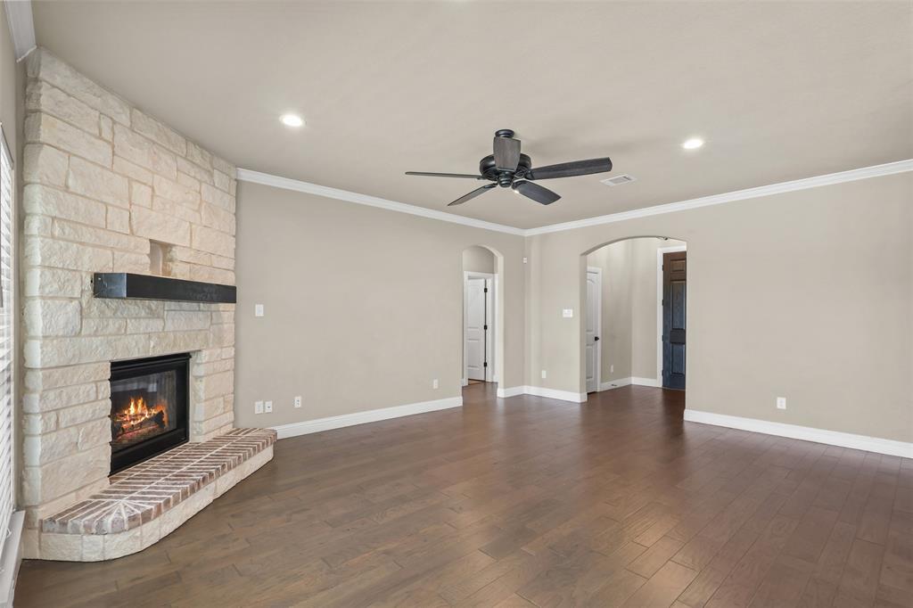 2451 Neck Road Palmer, TX 75152 - Photo 8 of 32 a view of an empty room with a fireplace