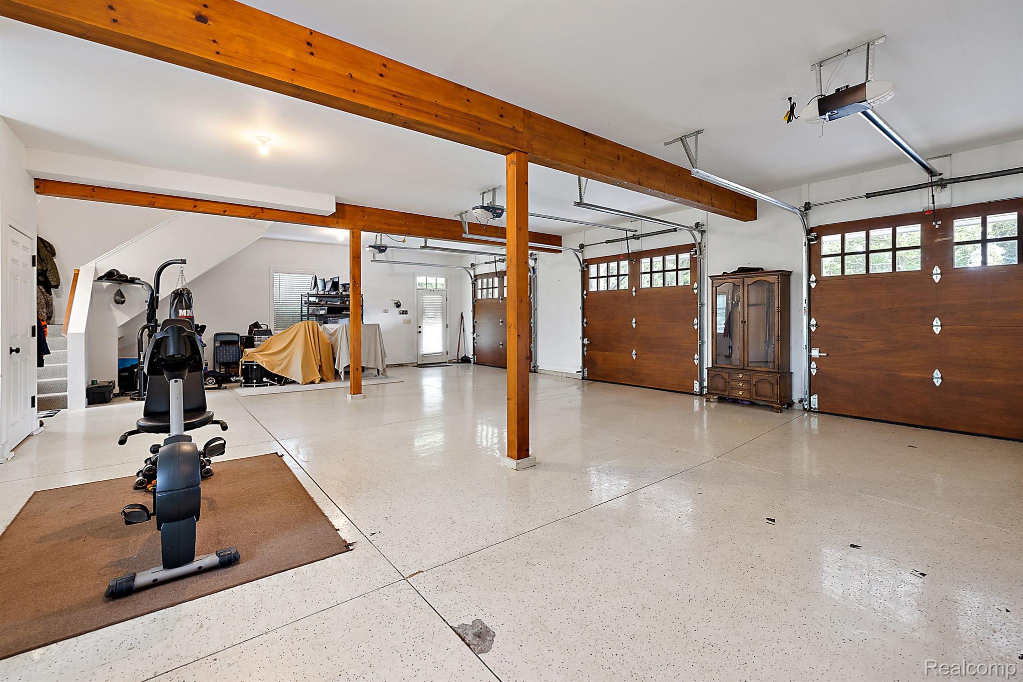 5245 North Adams Road Rochester, MI 48306 - Photo 61 of 75 3 car garage with epoxy floor, heating, and water