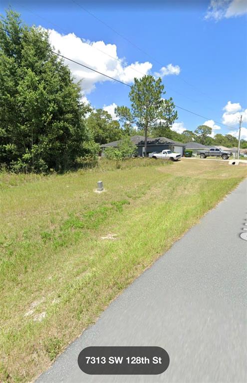 128 Southwest Sw Street Ocala, FL 34473 - Photo 2 of 3 a view of an ocean and beach