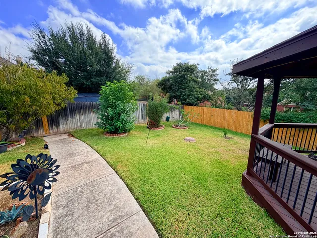a view of a porch with a yard