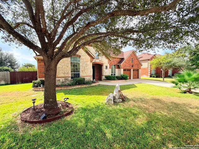 a view of a house with swimming pool and porch with furniture