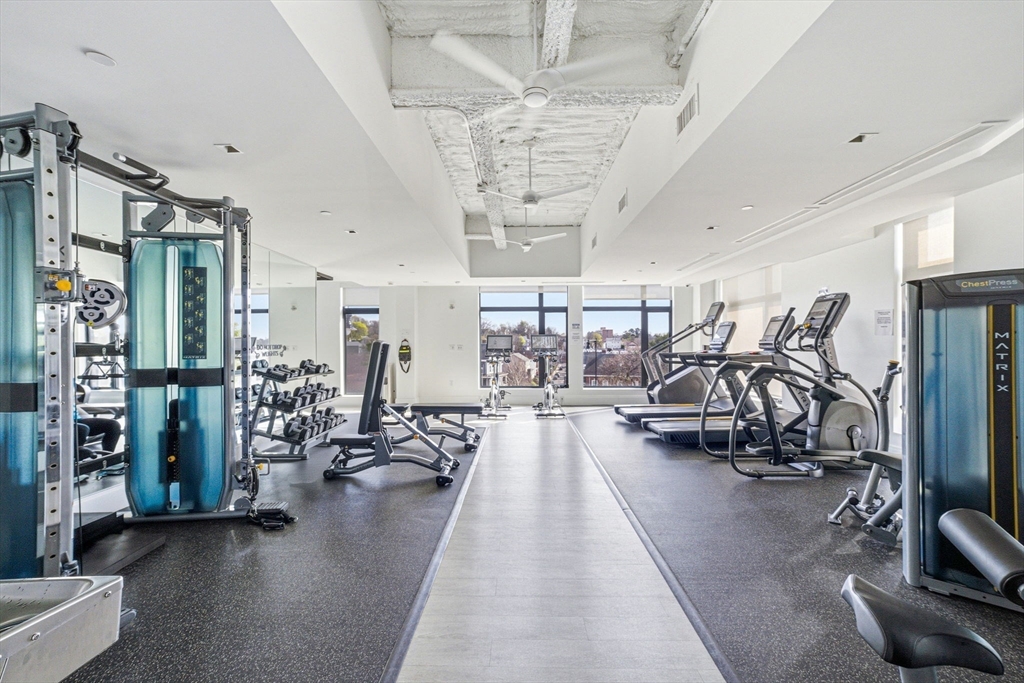 191 Washington Street, Unit 413 Boston, MA 02135 - Photo 37 of 40 a view of a room with gym equipment