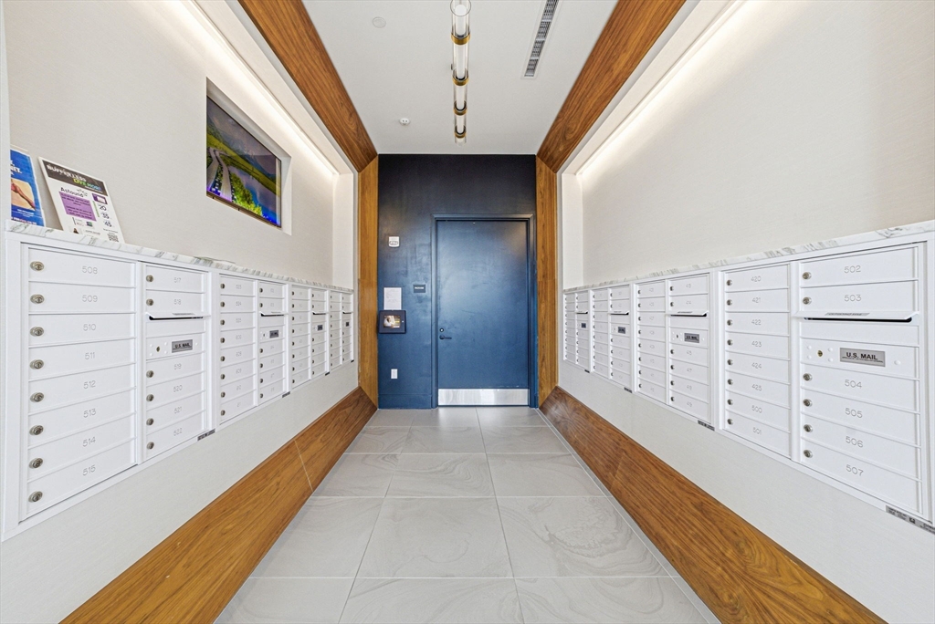 191 Washington Street, Unit 413 Boston, MA 02135 - Photo 9 of 40 a view of entryway with stairs