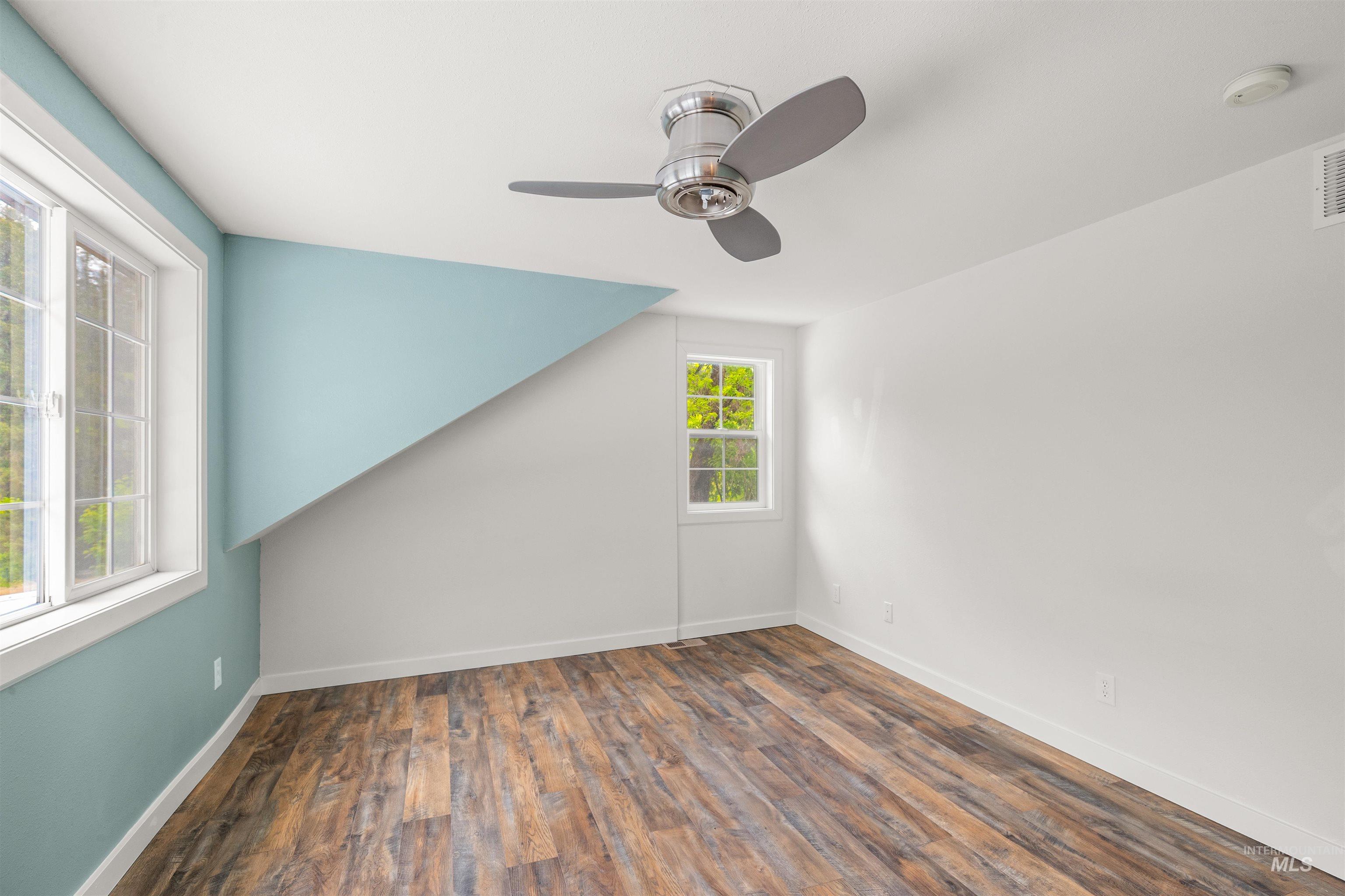 1314 Cedar Ridge Road Kendrick, ID 83537 - Photo 28 of 50 Room featuring wood-finish flooring, white baseboards, and a contemporary ceiling fan