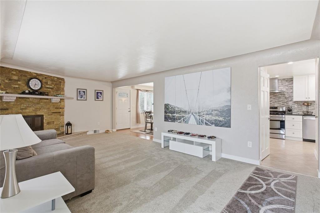 120 Crestview Manor Monongahela, PA 15063 - Photo 12 of 38 a living room with furniture and a fireplace