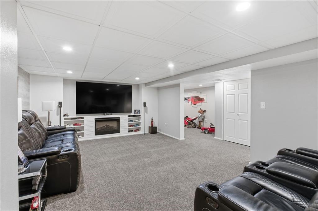 120 Crestview Manor Monongahela, PA 15063 - Photo 23 of 38 a living room with furniture and a flat screen tv