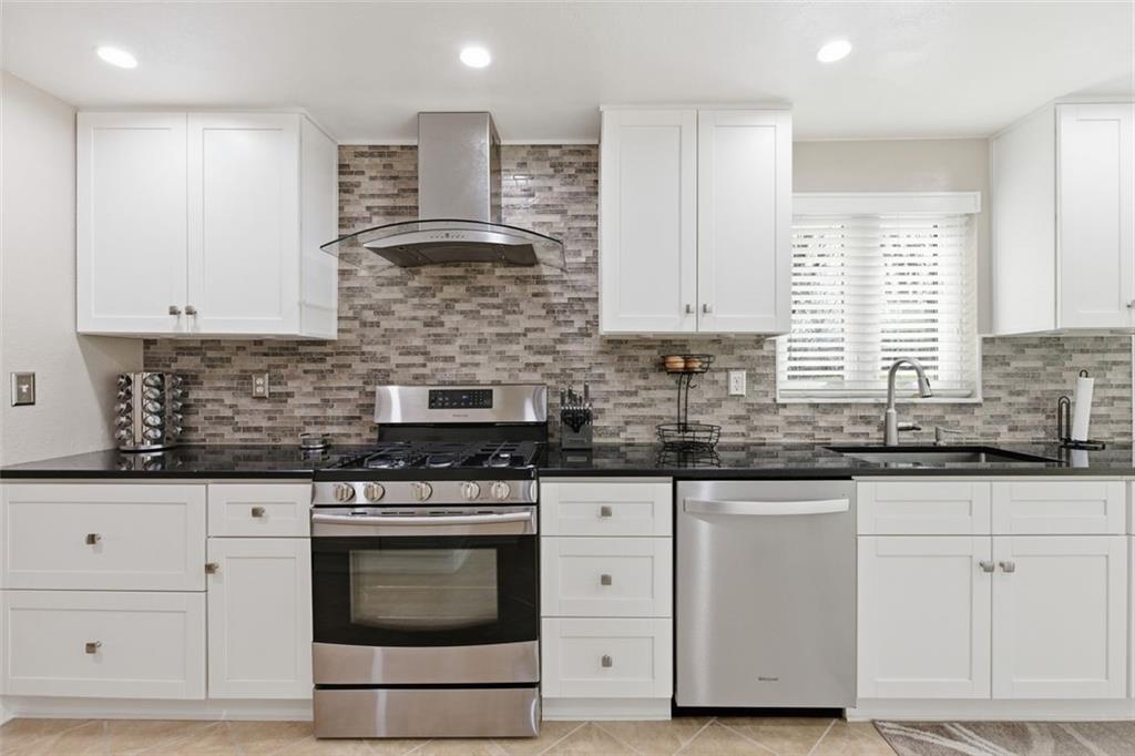 120 Crestview Manor Monongahela, PA 15063 - Photo 5 of 38 a kitchen with granite countertop white cabinets and white stainless steel appliances