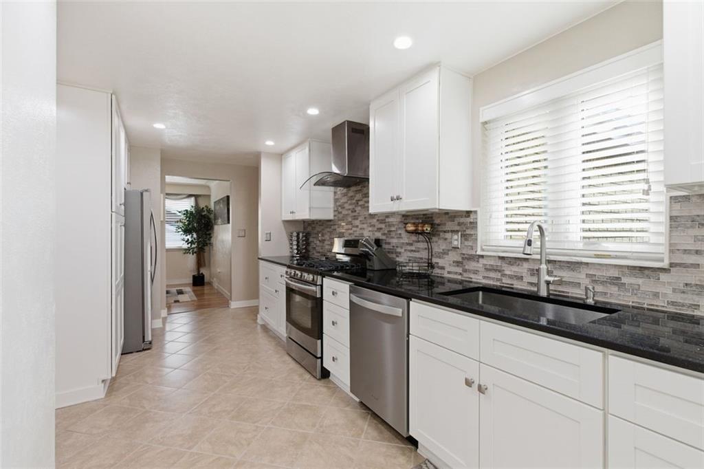 120 Crestview Manor Monongahela, PA 15063 - Photo 6 of 38 a kitchen with stainless steel appliances granite countertop a sink and a stove