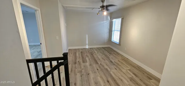 a view of a swimming pool with a yard