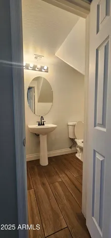 a view of a swimming pool and outdoor seating