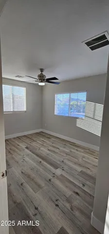 a view of an outdoor space and tennis court