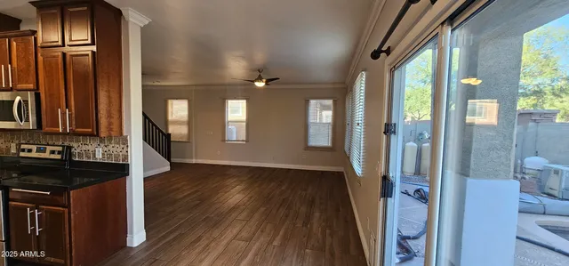 a view of room with hardwood floor