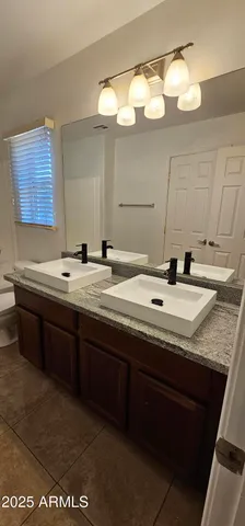 a view of livingroom with hallway and stairs