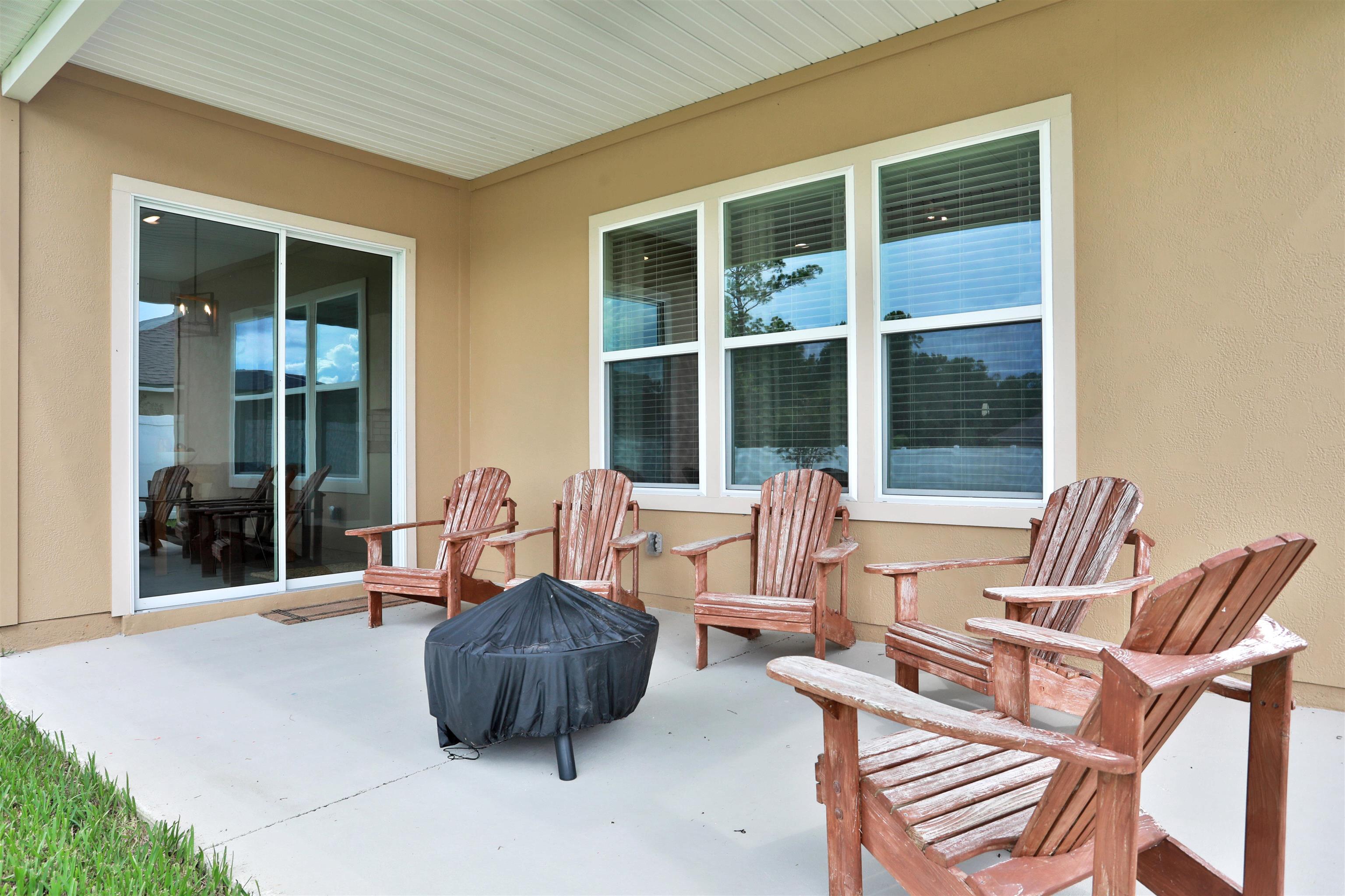 123 Hickory Ridge Road St. Augustine, FL 32084 - Photo 27 of 29 a living room with furniture and a large window