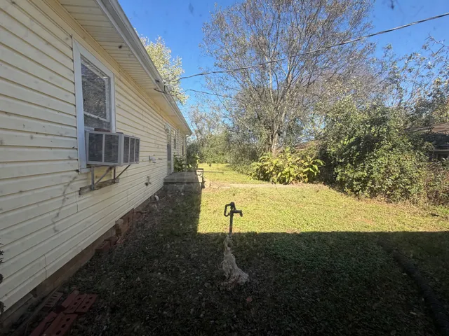 a view of outdoor space and yard