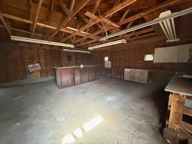 a view of room with wooden ceiling