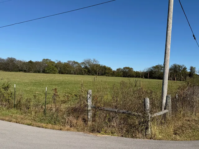 a view of a lake with mountain in the background
