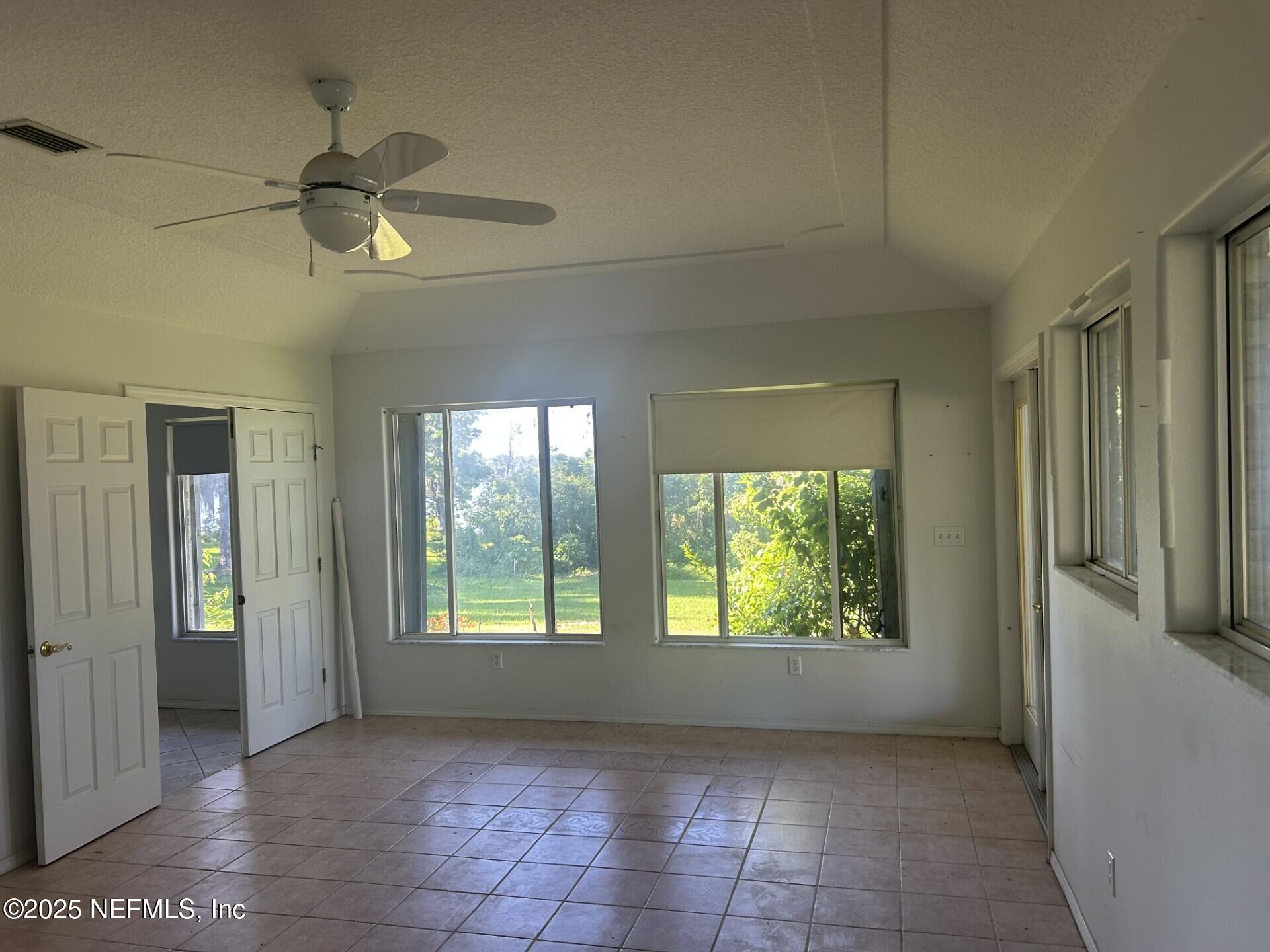 121 Walton Road East Palatka, FL 32131 - Photo 24 of 48 a view of an empty room with a window