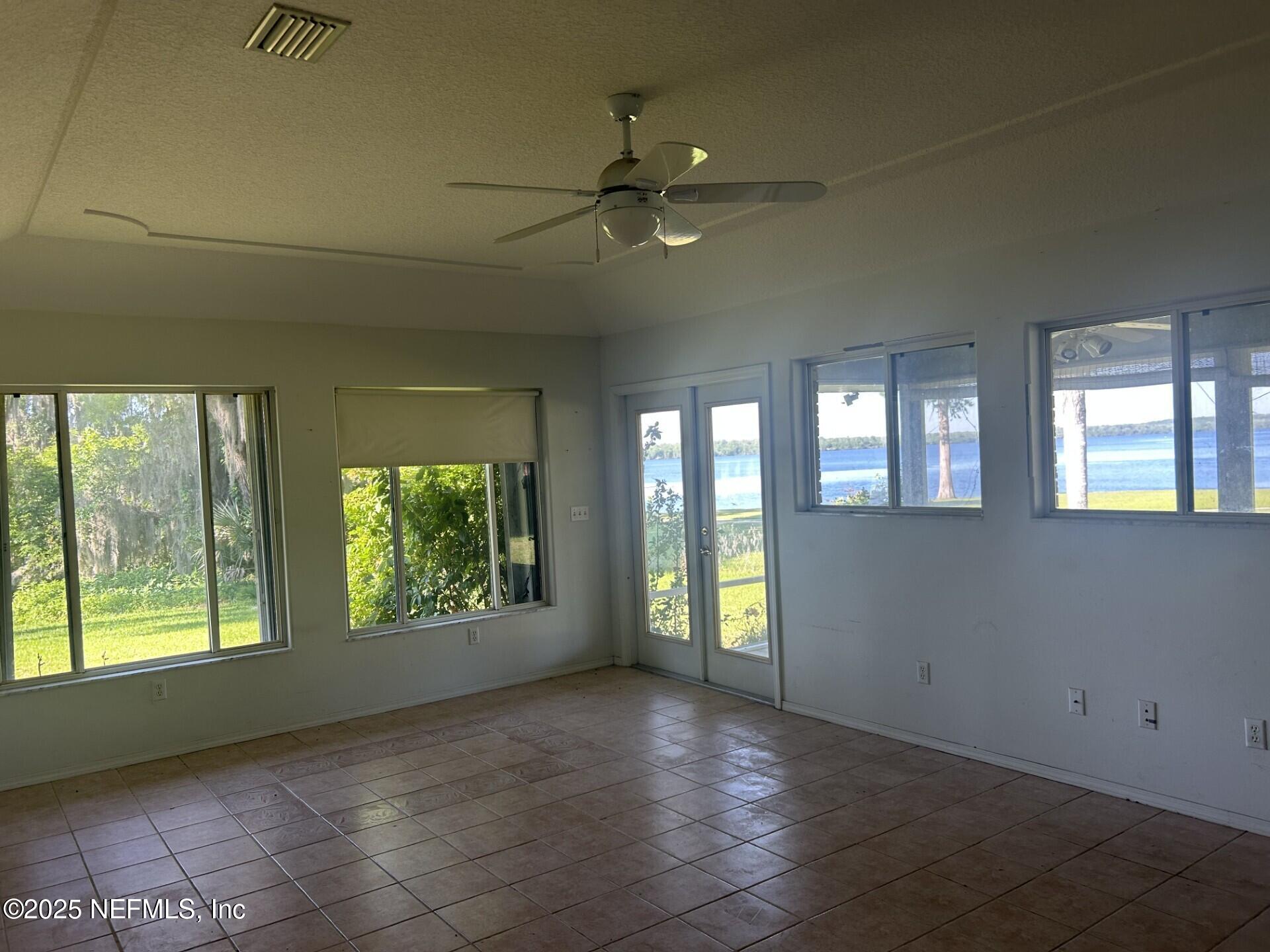 121 Walton Road East Palatka, FL 32131 - Photo 25 of 48 an empty room with windows and closet