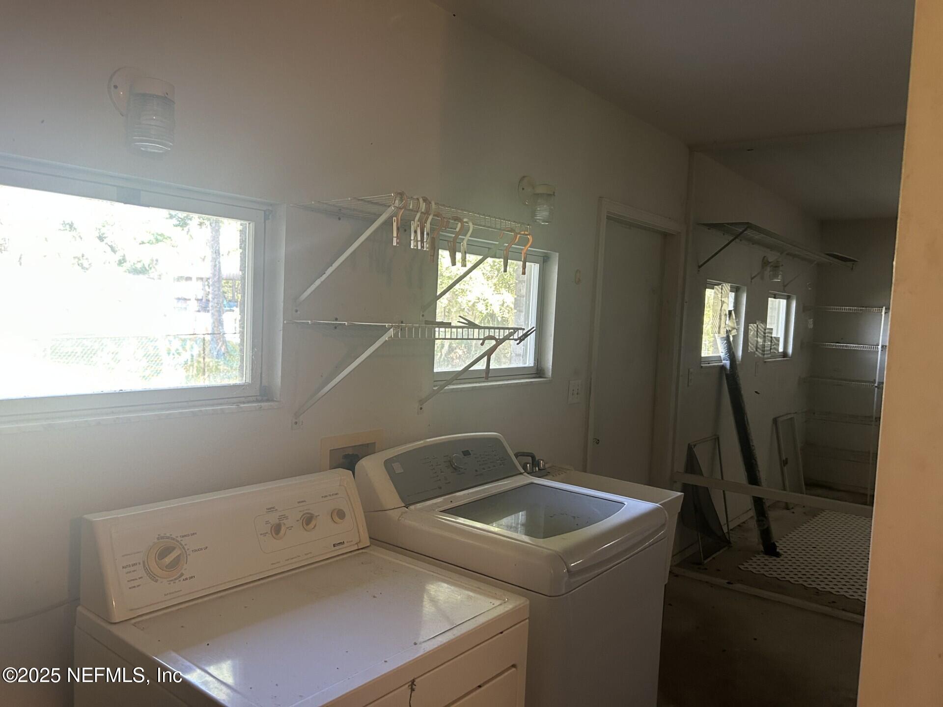 121 Walton Road East Palatka, FL 32131 - Photo 30 of 48 a utility room with dryer and washer