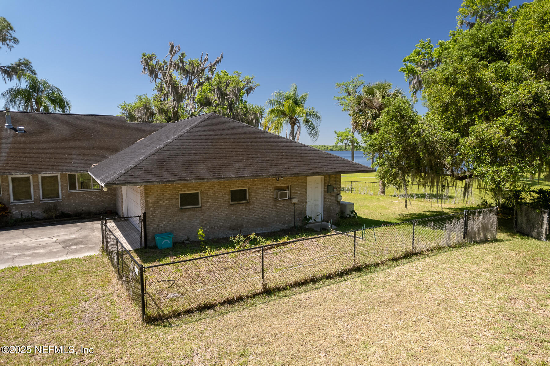 121 Walton Road East Palatka, FL 32131 - Photo 35 of 48 a front view of a house with a yard and garage