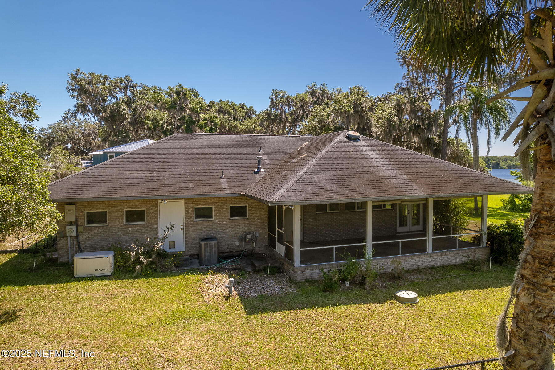 121 Walton Road East Palatka, FL 32131 - Photo 36 of 48 a house with a swimming pool in front of it