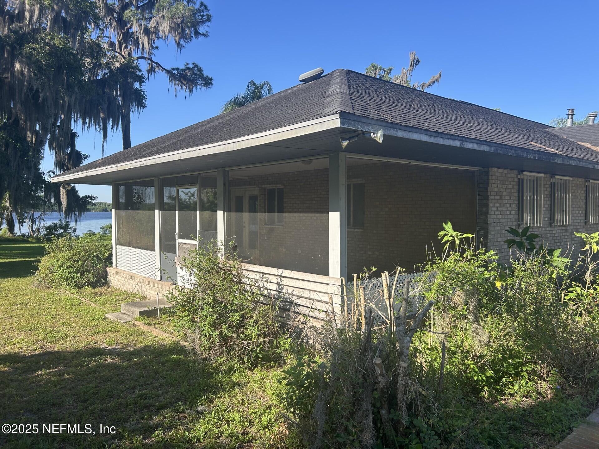 121 Walton Road East Palatka, FL 32131 - Photo 40 of 48 a view of a house with a small yard and plants