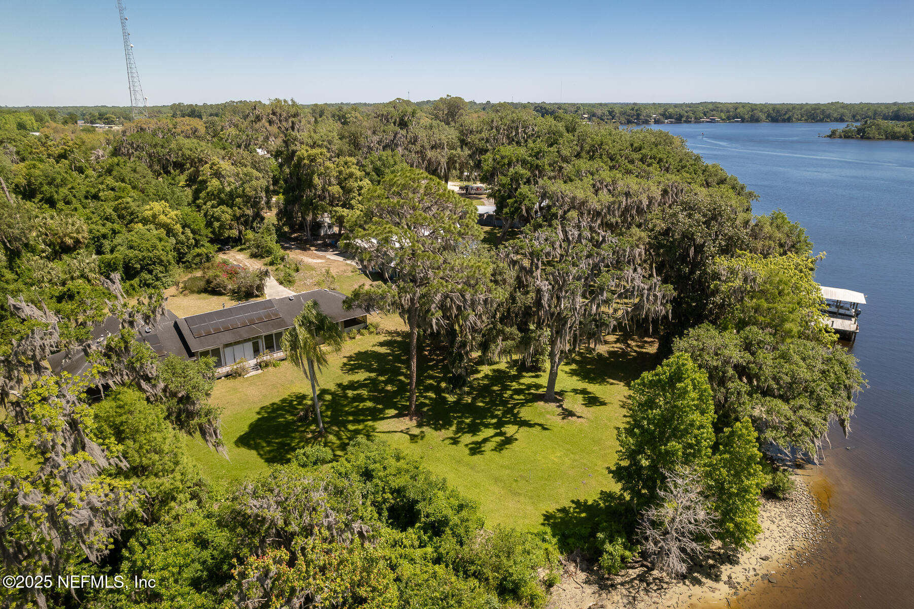 121 Walton Road East Palatka, FL 32131 - Photo 8 of 48 an aerial view of residential house with outdoor space and trees all around
