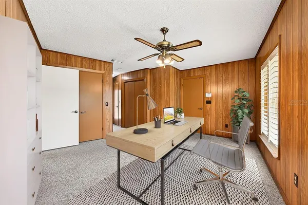 a bathroom with a toilet a sink and a mirror