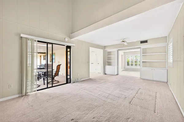a view of an empty room and closet