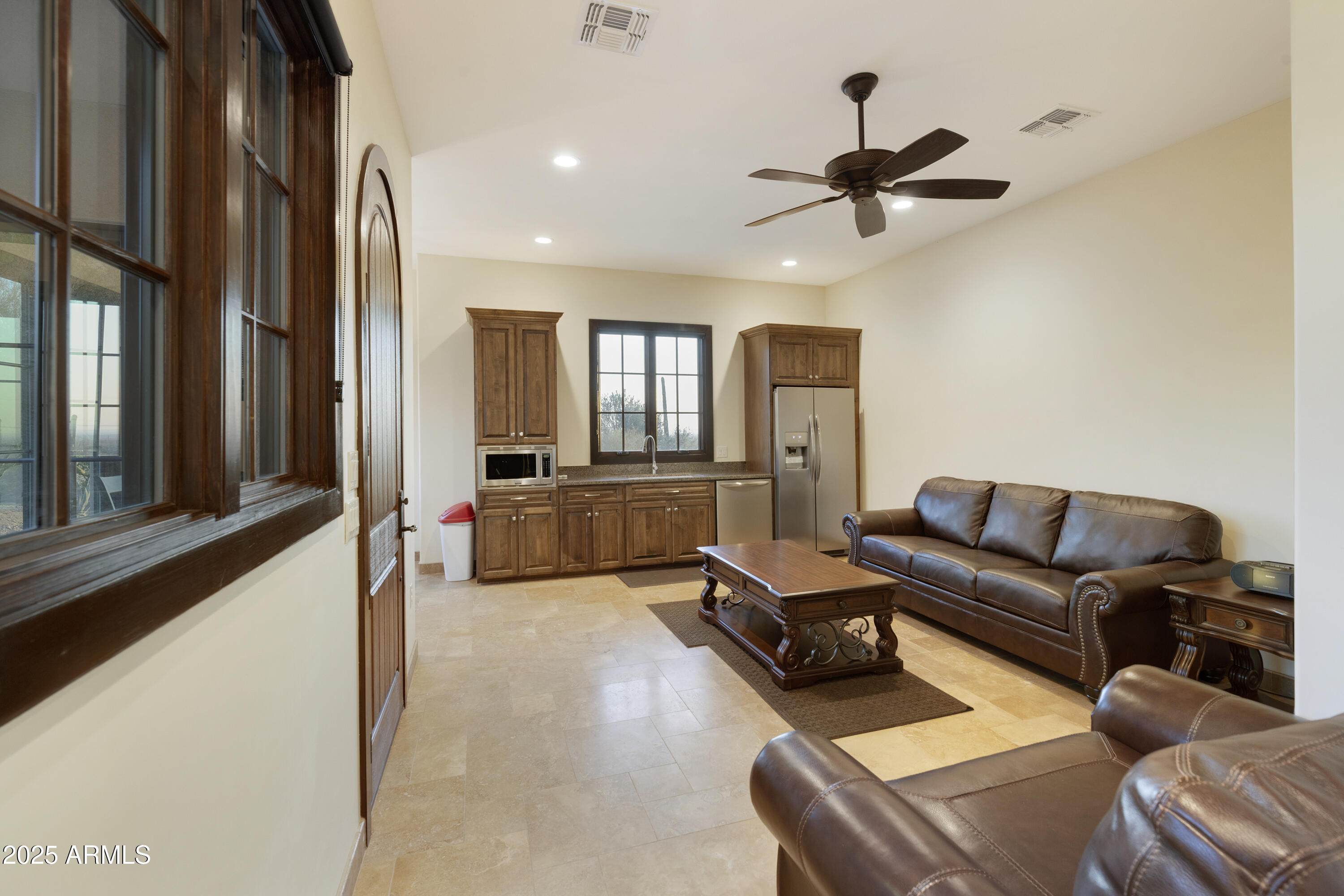 5117 North Cortez Road Apache Junction, AZ 85119 - Photo 40 of 61 a living room with furniture and a large window