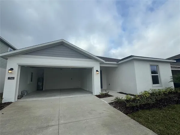 a view of a house with a garage