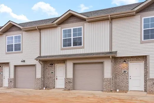 940 Britton Springs Road, Unit 605 Clarksville, TN 37042 - Photo 2 of 30 a front view of a house with garage