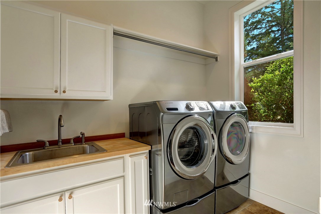 19531 183rd Way Southeast Renton, WA 98058 - Photo 22 of 40 a utility room with dryer and washer