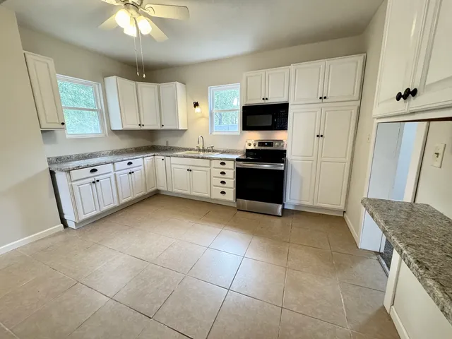 a view of kitchen and utility room