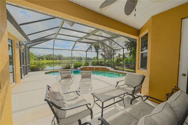 a view of a workspace with furniture