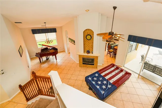 a view of a swimming pool with a yard