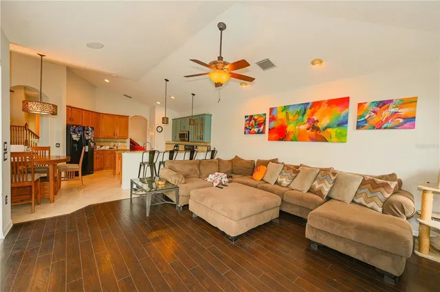 a swimming pool with barbeque oven in front of it