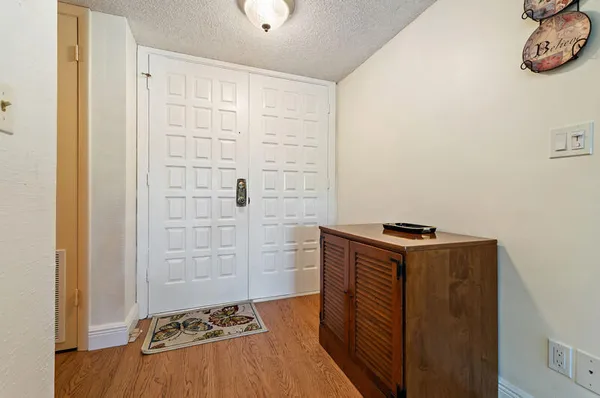 a view of swimming pool with outdoor seating